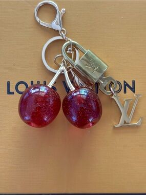 AUTHENTIC LOUIS VUITTON
BRASS LOCK & KEY #304, LARGE RED CHERRY BAG CHARM, 6 in